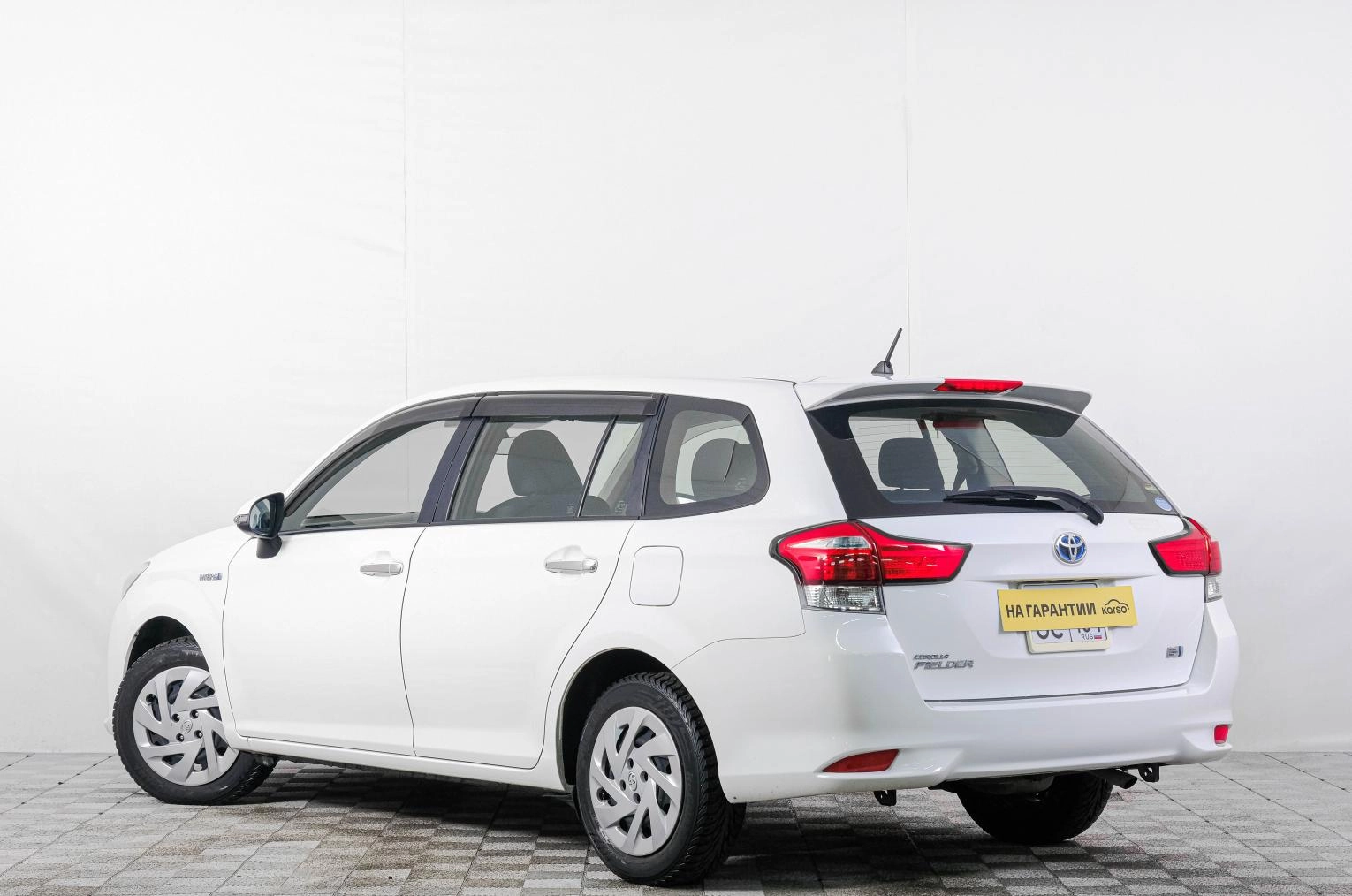 Toyota Corolla Fielder 4 из 21