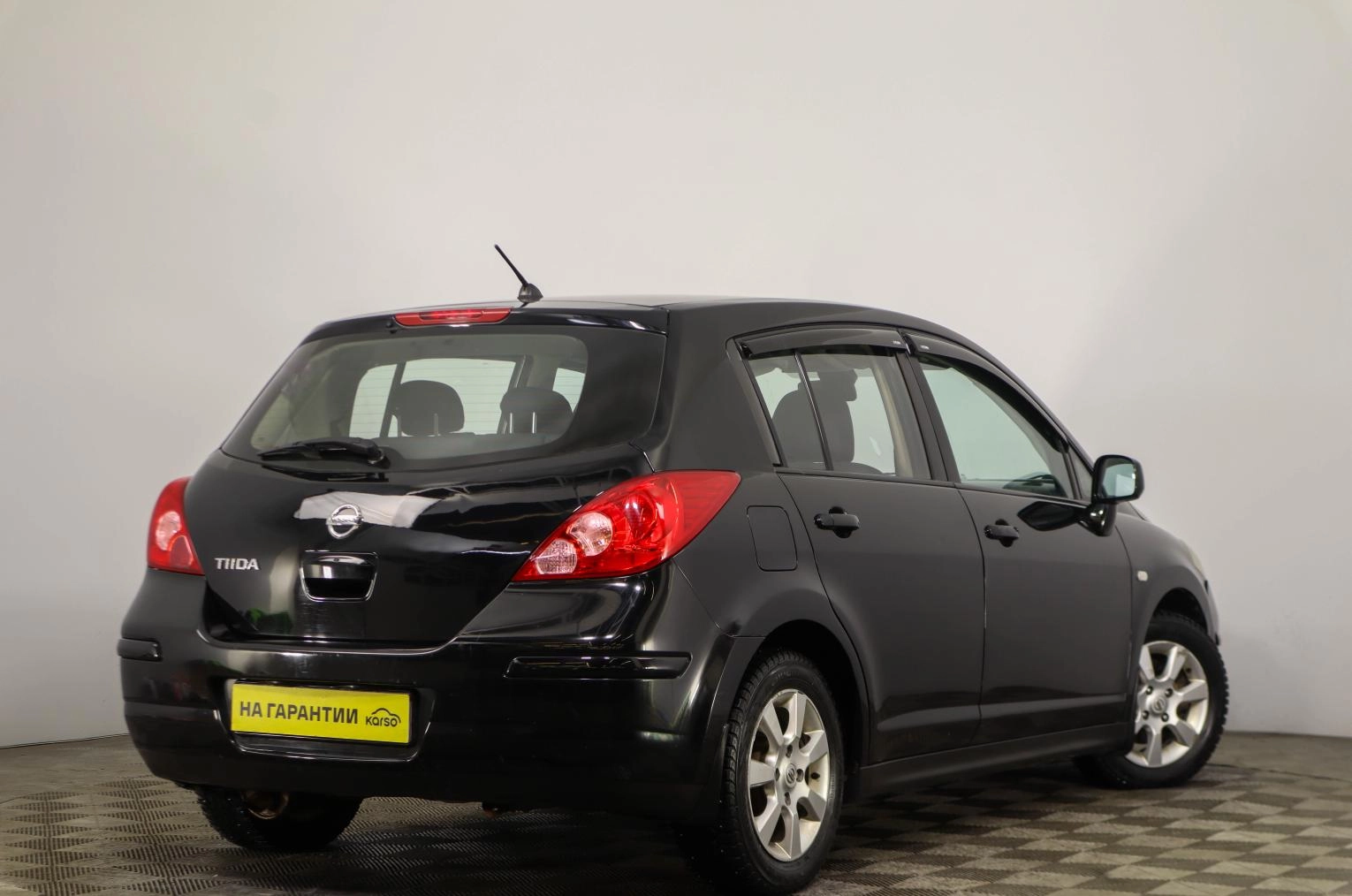 Nissan Tiida 4 из 20