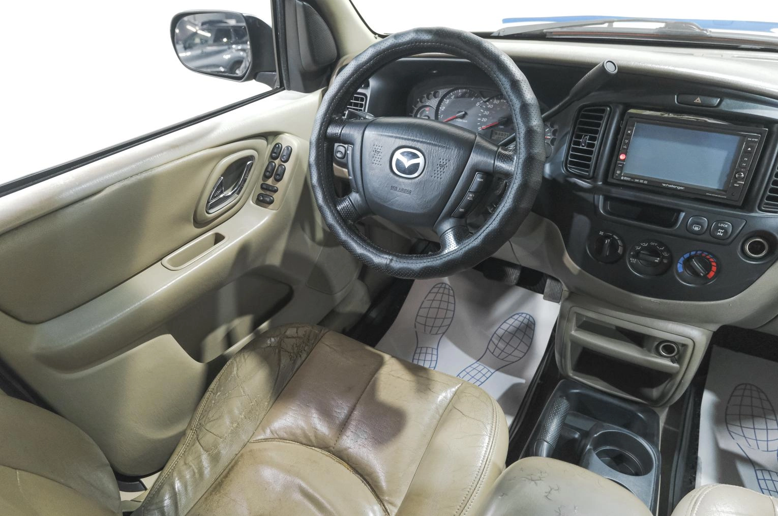 Mazda Tribute 9 из 24