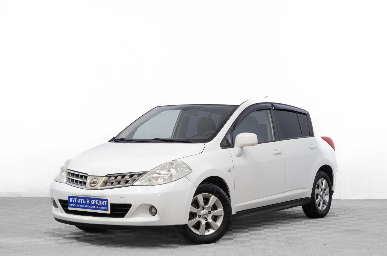 Nissan Tiida 3 из 25