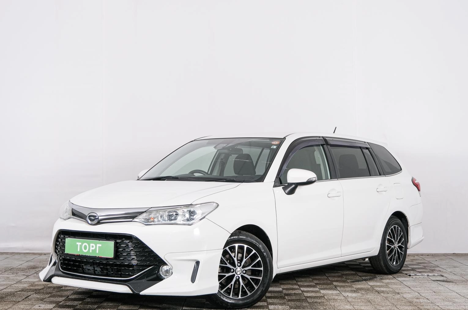 Toyota Corolla Fielder 3 из 21
