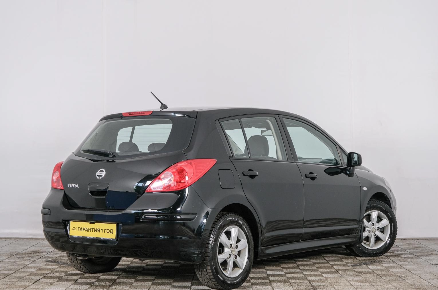 Nissan Tiida 6 из 21
