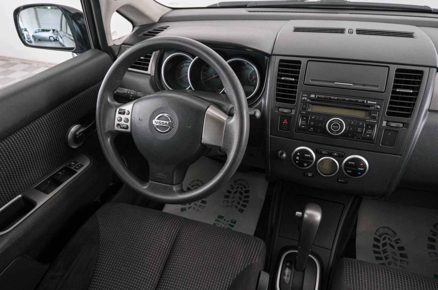 Nissan Tiida 9 из 21
